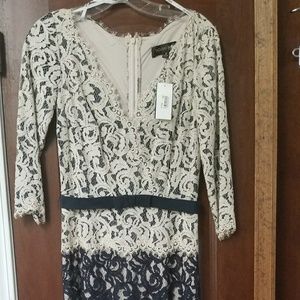 Beautiful navy and beige belted lace gown